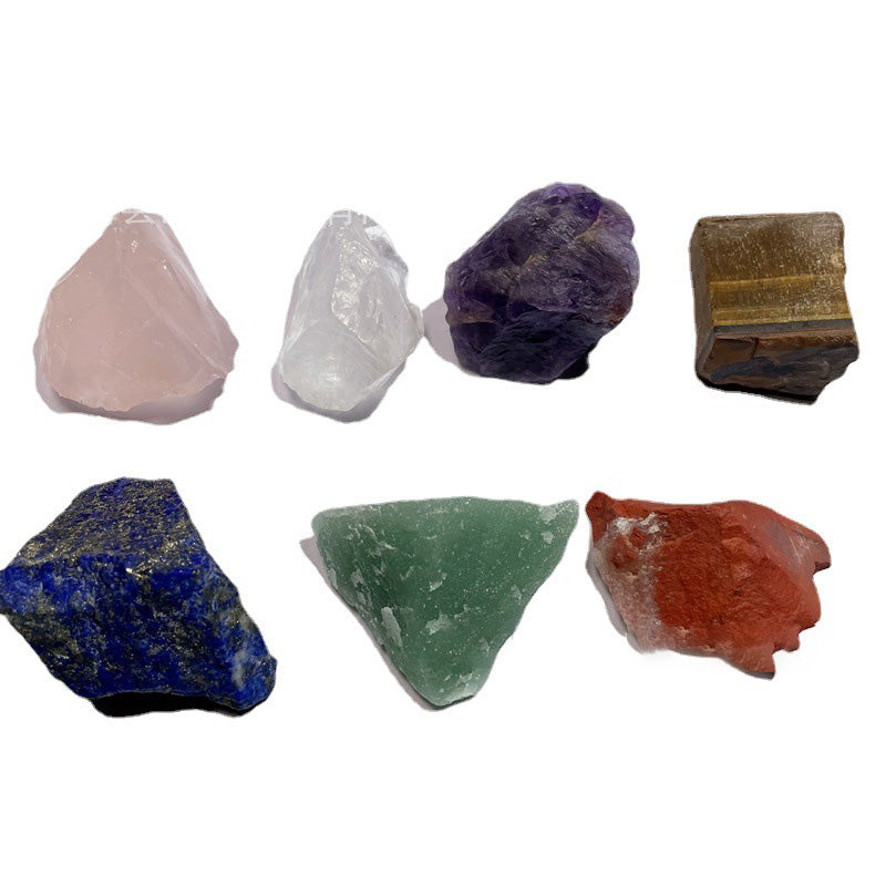 A group of Wholesale Amazon Cross-border Seven Chakra Natural Crystal Rough Stone Ornament Seven Color Healing Stone Yoga Meditation Energy Stones by Maramalive™ on a white background.