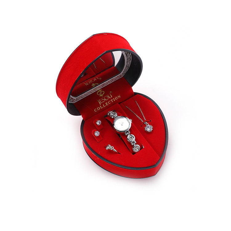 A red heart-shaped box with a Maramalive™ Radiant Jewelry Ensemble to Dazzle and Delight - Beautiful Jewelry set including Zircon Earrings, Ring, Pendant, and Watch inside.