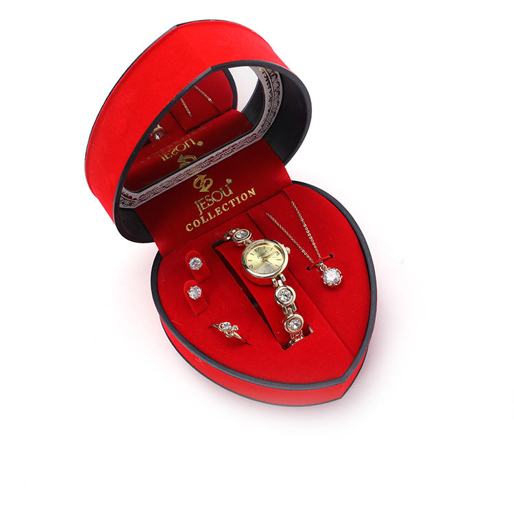 A red heart-shaped box with a Maramalive™ Radiant Jewelry Ensemble to Dazzle and Delight - Beautiful Jewelry set including Zircon Earrings, Ring, Pendant, and Watch inside.
