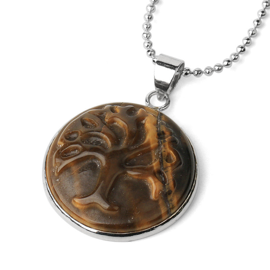 A Natural Stone Pendant Necklace with Tree of Life Carving and Purple Crystal Bead on a silver chain, Maramalive™ brand.