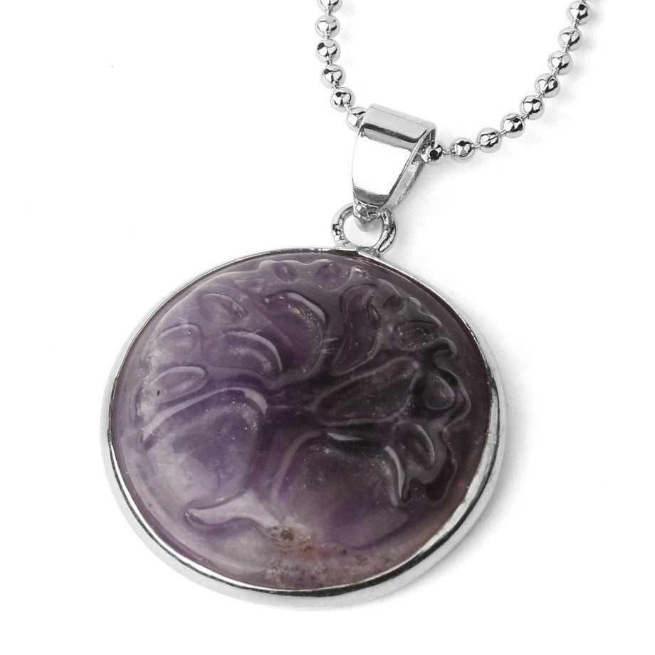A Natural Stone Pendant Necklace with Tree of Life Carving and Purple Crystal Bead on a silver chain, Maramalive™ brand.