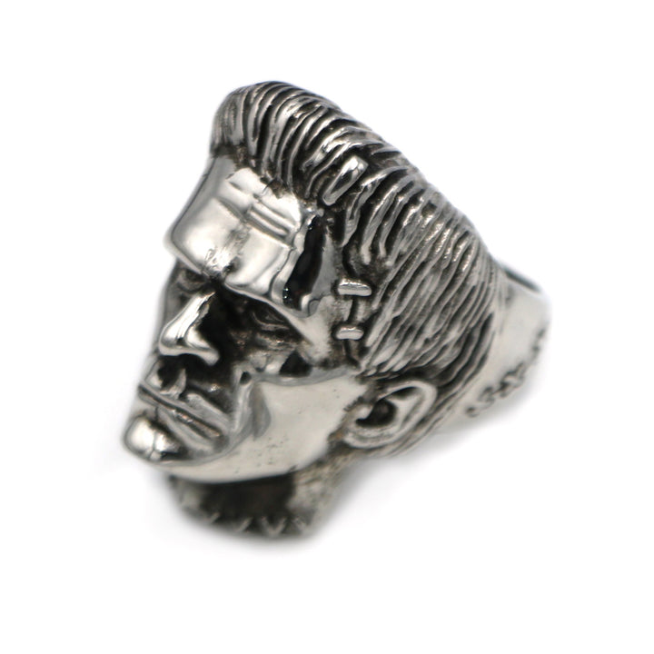 A silver Science Fiction Victor Frankenstein Rings Punk Horror Scientist Stainless Steel Skull Ring Men's Biker Jewelry with a frankenstein head on it from Maramalive™.