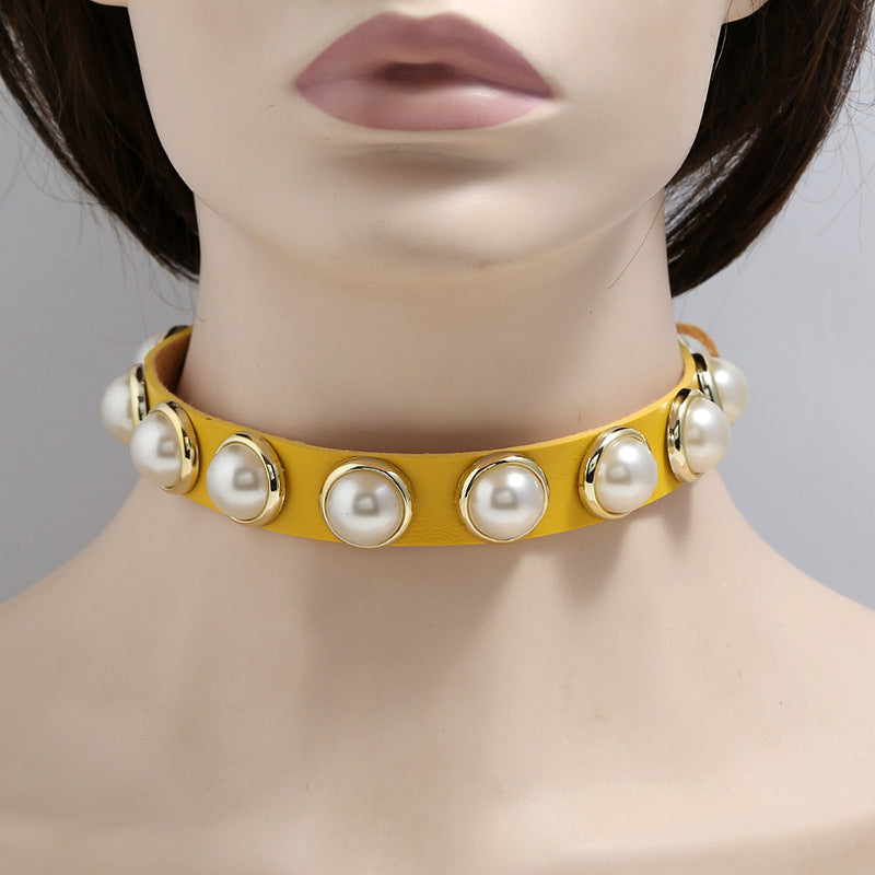A mannequin wearing a Maramalive™ Leather Choker Collar For Women Gothic Punk Chain with pearls.