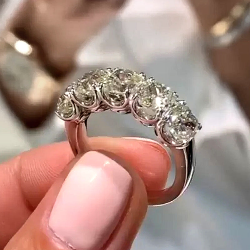 A Maramalive™ New Fashion Round Diamond Ring Zircon Ring with diamonds on it.
