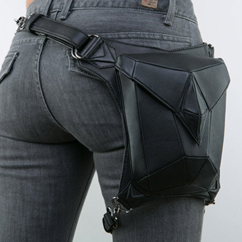 A woman is holding a black leather Maramalive™ Steampunk Locomotive Bag Shoulder Messenger Bag Female Mobile Phone Waist Bag.