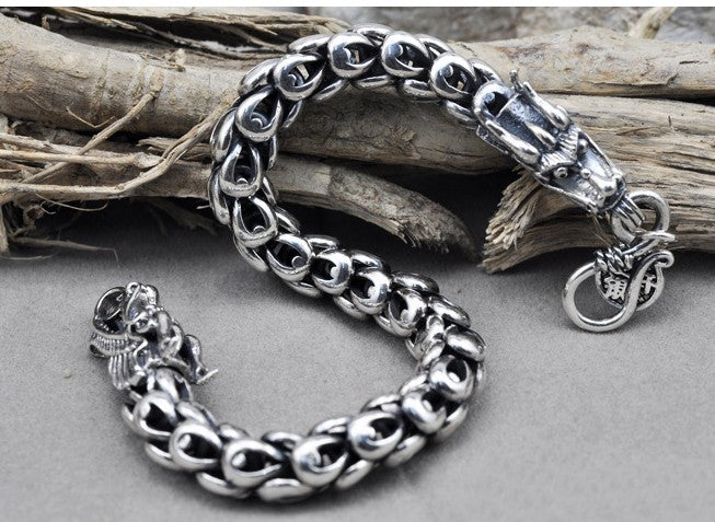A Maramalive™ S925 Sterling Silver Dragon Scale Retro Bracelet with a dragon head on it.