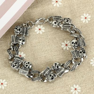 A Ghastly Glam: SKELETON VINTAGE BRACELET by Maramalive™, with morbidly marvelous skulls and chains.