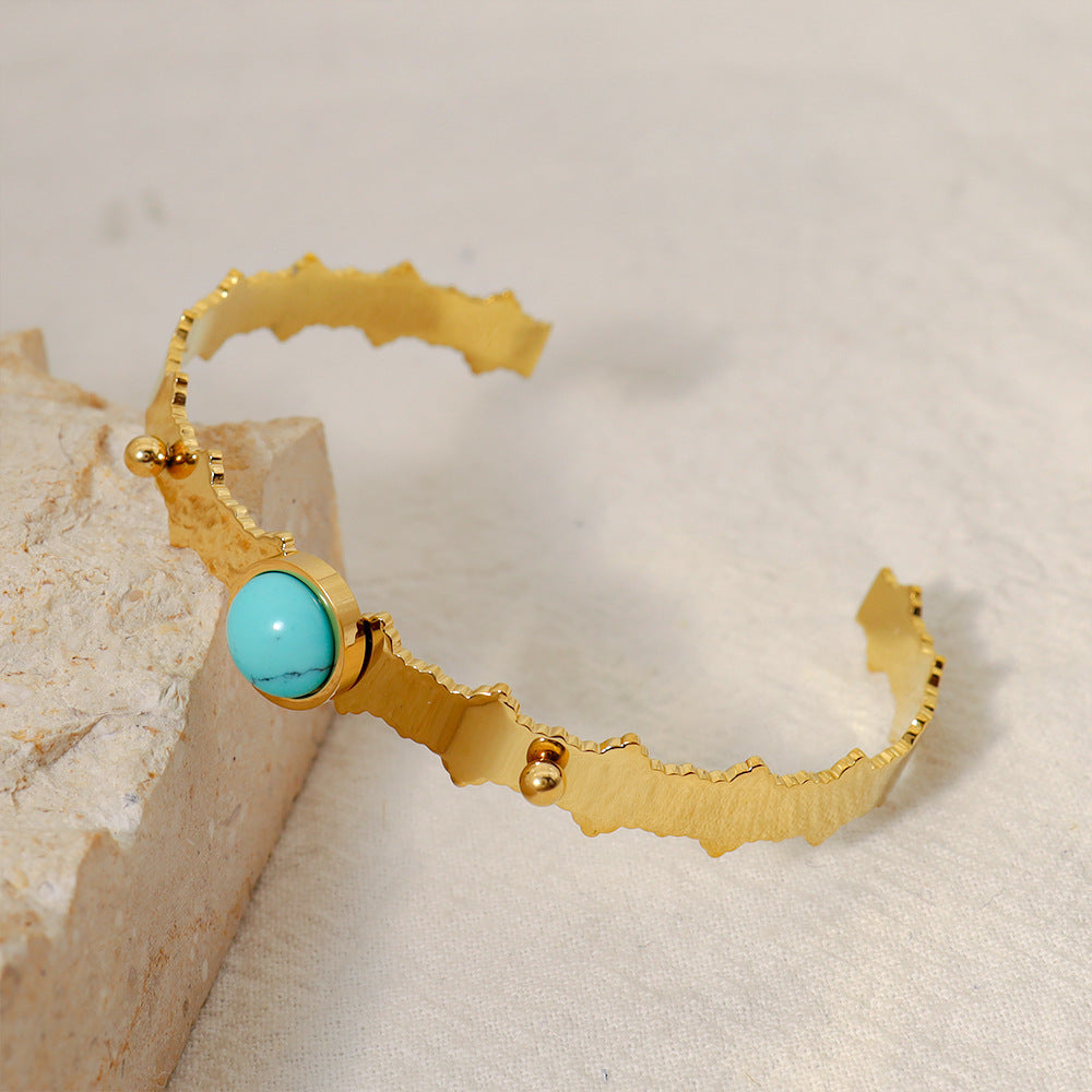 A Maramalive™ gold cuff bracelet with a Blue Turquoise Natural Stone Edge Titanium Steel Electro-plated Bracelet.