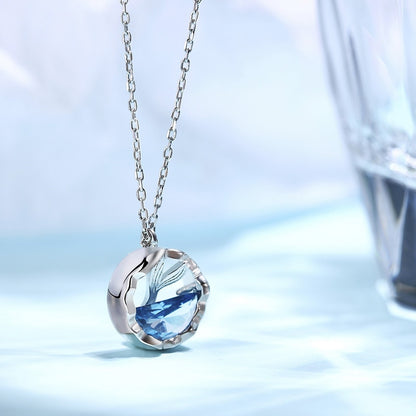 A silver necklace with a Mermaid Tears Pendant by Maramalive™.