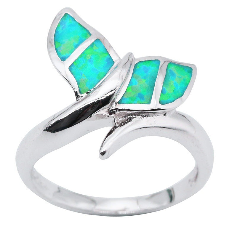 A Maramalive™ Opal Mermaid Tail Ring with a blue opal butterfly.