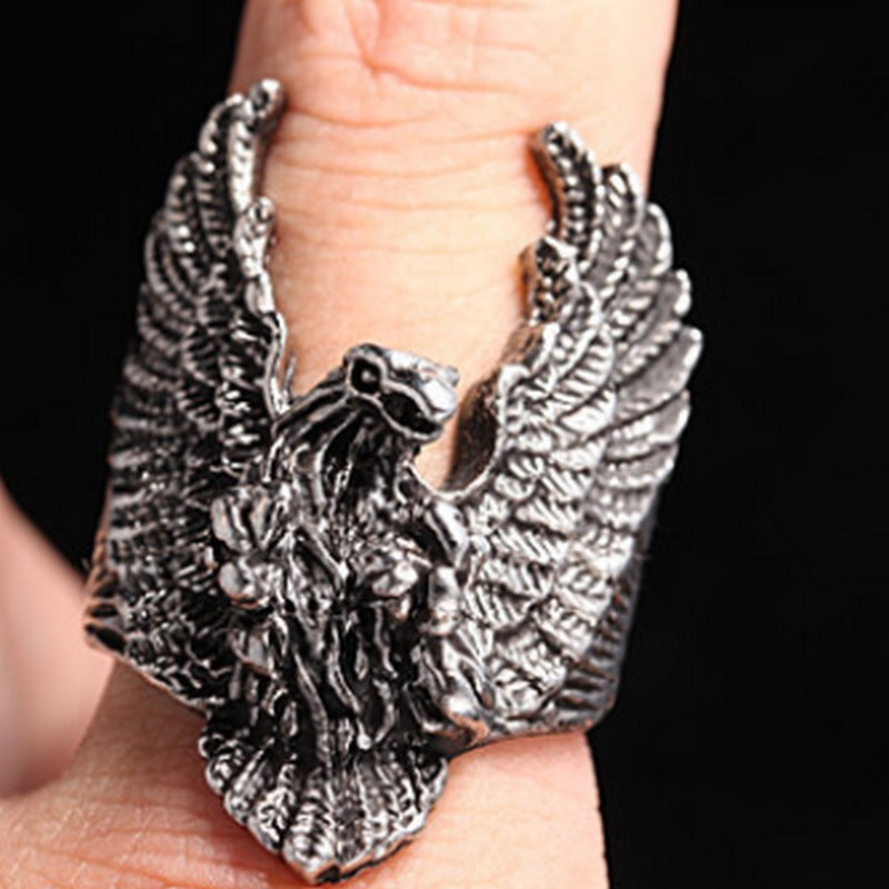 An vintage-inspired Maramalive™ Wings of Destiny eagle ring with talon-tastic details, making a statement on a person's finger.