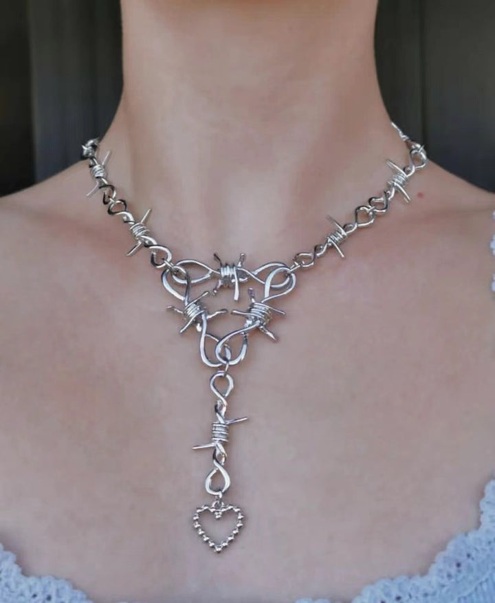 Love Heart Thorns Vintage Necklace | Barbed Wire Statement Necklace worn by a woman