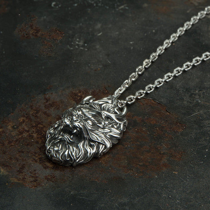 A silver necklace with a Maramalive™ S999 Dragon Head Pendant on it.