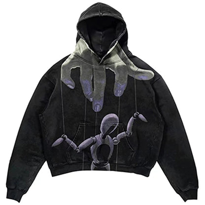 A Popular Skull Print Design Hoodie Retro Street Gothic Style by Maramalive™ featuring a design of a large hand controlling a puppet with strings on the front, infused with an urban edge. The hoodie has a kangaroo pocket and a drawstring hood, perfect for adding a touch of gothic street style to your wardrobe.