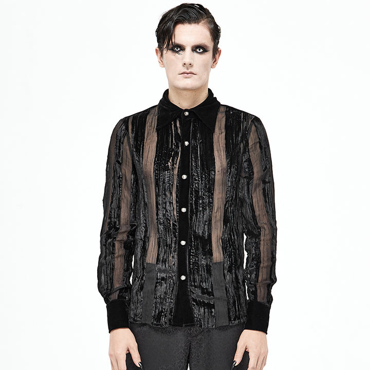 A person with dark eye makeup and a serious expression wears a Maramalive™ Men's Demon Fashion Gothic Striped Velvet Burnt-out Pleated Shirt on a plain white background.