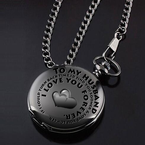 A Maramalive™ retro black fashion silver smooth steampunk quartz pocket watch on a stainless steel chain necklace, 30 cm long for men and women, with a gift box, on a black surface.