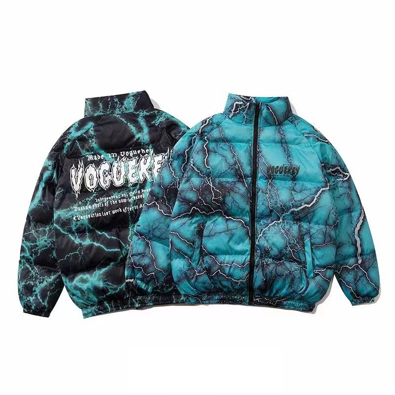 Two jackets with teal and black marble patterns. The one on the left, an **Oversized Hip Hop Coat - Loose Fitting Urban Streetwear** from **Maramalive™**, has bold white text on the back, while the one on the right features dark graffiti printing with a front zipper and smaller text on the front.