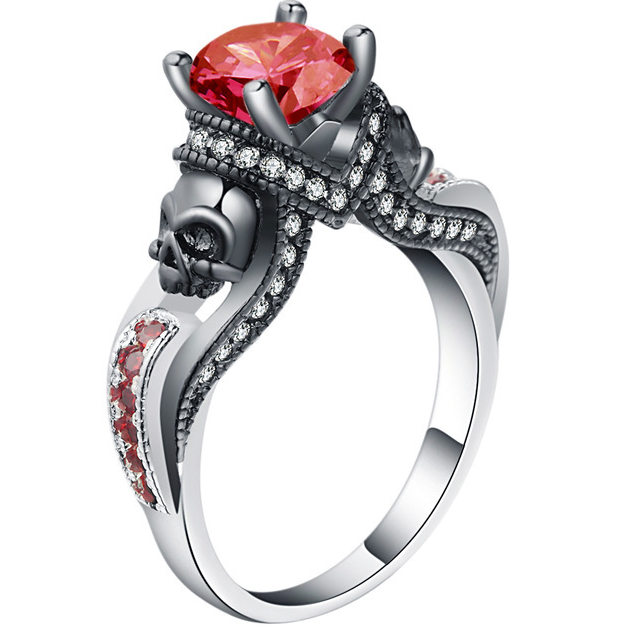 A Magical Gem Skull Ring for Adventurous Souls by Maramalive™, with a pink sapphire and skulls.