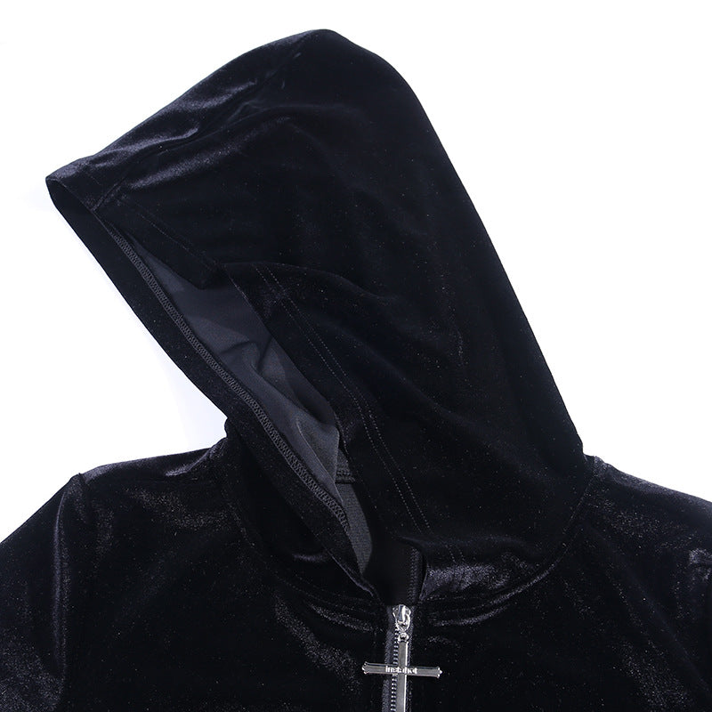 A girl in a Dark Punk Halloween Velvet Cloak - Gothic Underworld Black Cape, by Maramalive™, standing in the dark woods.