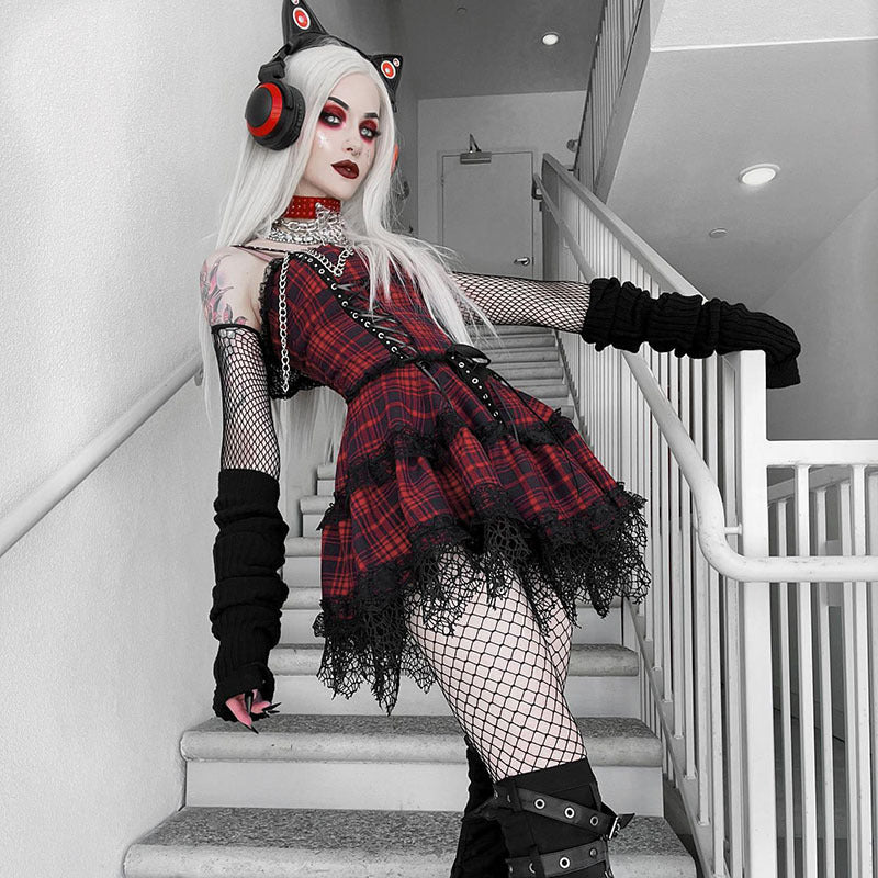 Two women in gothic outfits, one of them wearing the Maramalive™ New Gothic Plaid Suspender Dress - Underworld Tartan Mini-dress, sitting on stairs.
