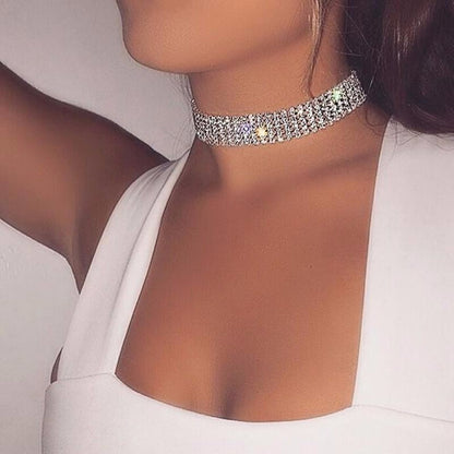A woman wearing a Maramalive™ Fashion Women Full Crystal Rhinestone Choker Necklace Wedding Jewelry Chokers Necklaces for Women.