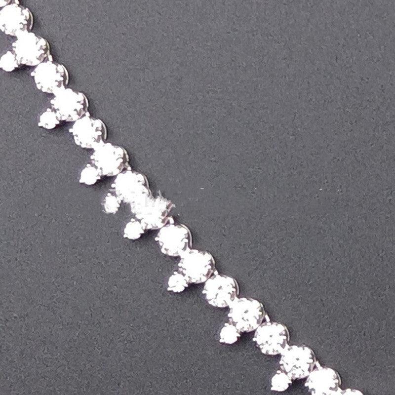 A Maramalive™ S925 Silver CZ Necklace for Women on a black background.