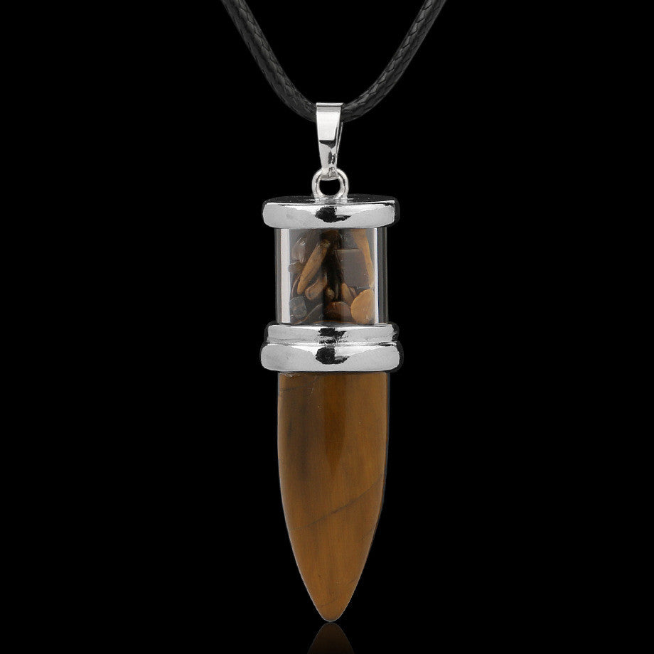 A Crystal Pendant with a white quartz stone on a black cord from Maramalive™.