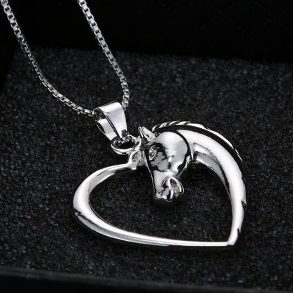 A Maramalive™ Silver Horse Head Necklace on a chain.