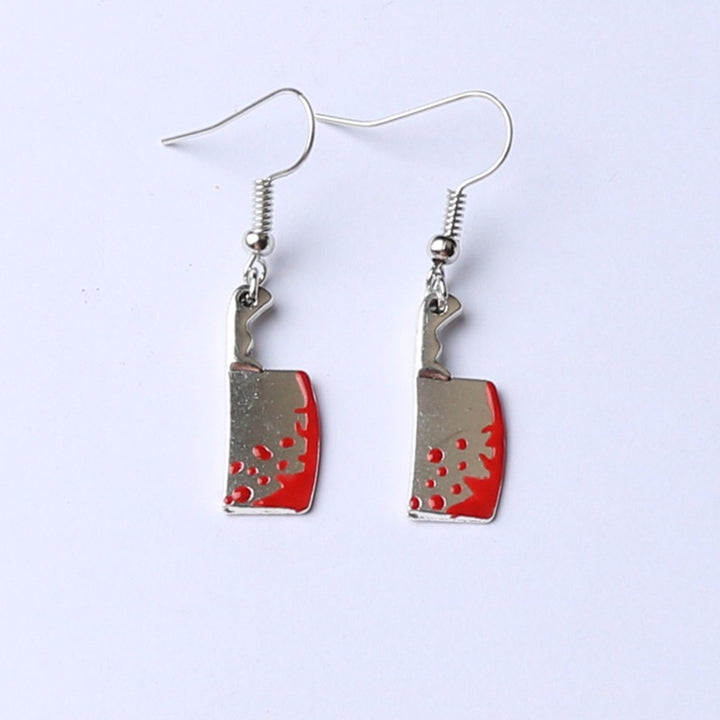 A pair of Drop Dead Gorgeous for Halloween Kitchen Knife Earrings by Maramalive™ with red blood on them.
