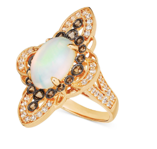 A Moonstone Crystal Ring from Maramalive™ with an opal and black diamonds.