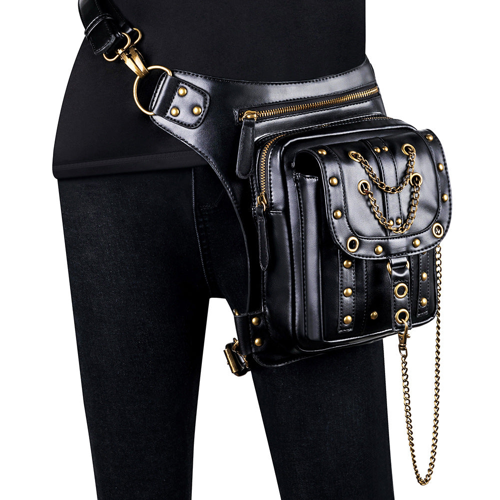 A woman is holding a Maramalive™ Steampunk Retro Vegan Cross-body bag for women with gold accents.