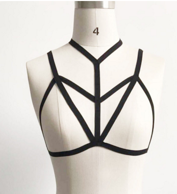 A close up of Maramalive™'s Gothic Body Harness Bra on a woman's cleavage.