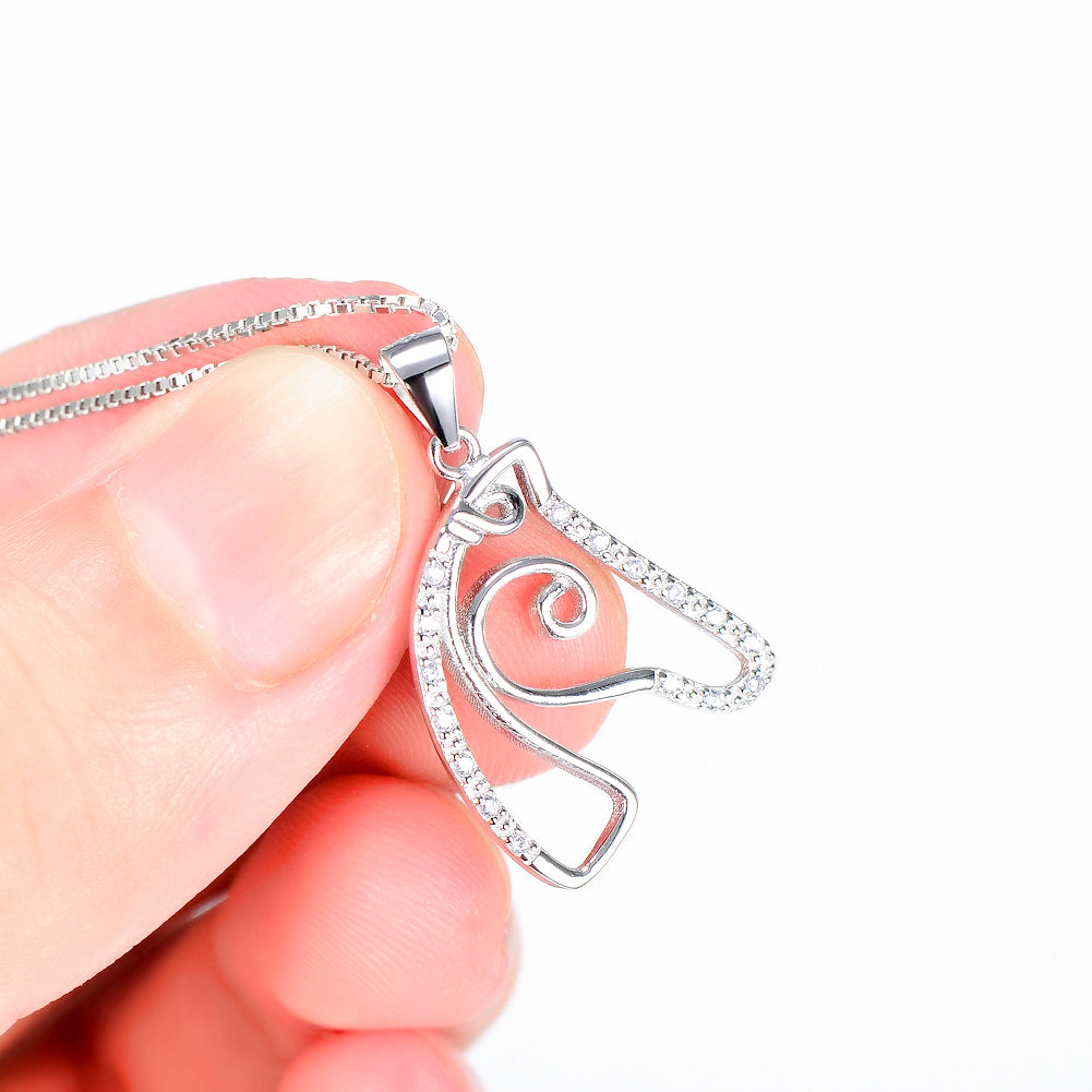 A Maramalive™ Horse Head Pendant Delicate Micro-Set Necklace with diamonds on a chain.