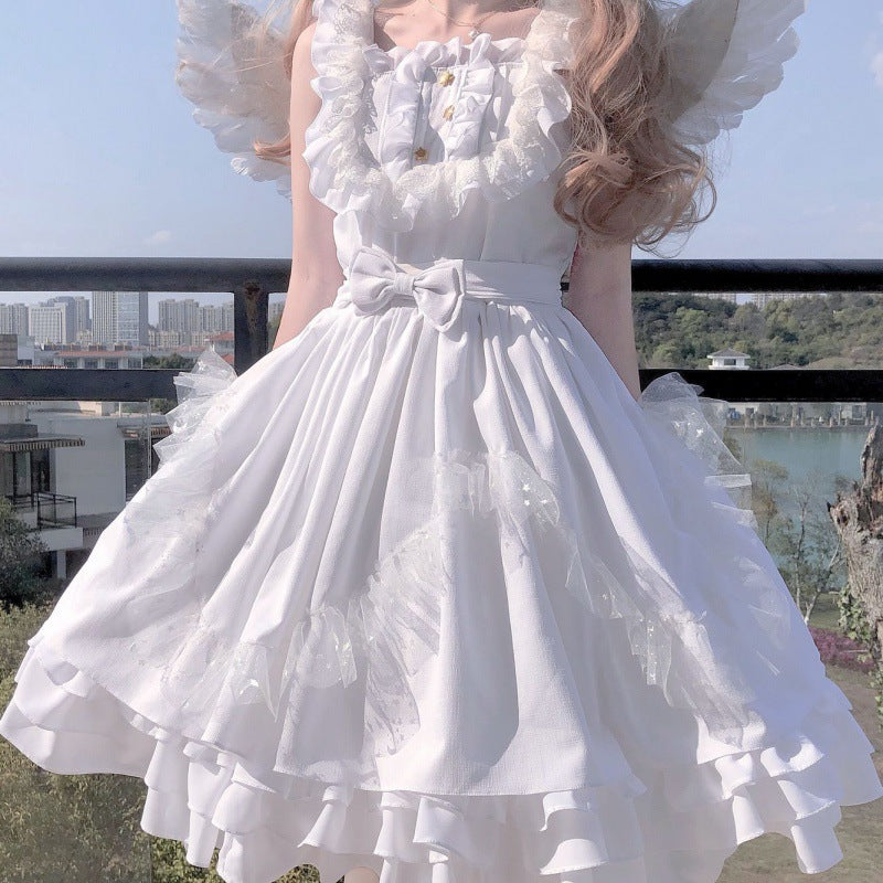 A girl showcasing her fashion style in a White Angel Jsk Fairytale Lolita Vintage Girls Gothic Lace Wedding Gown Cosplay Princess Dress made by Maramalive™.