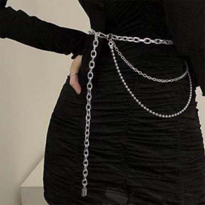 A woman wearing a black dress with a Maramalive™ Summer Body Jewelry Hip Hop Punk navel and Waist Jewelry belt.