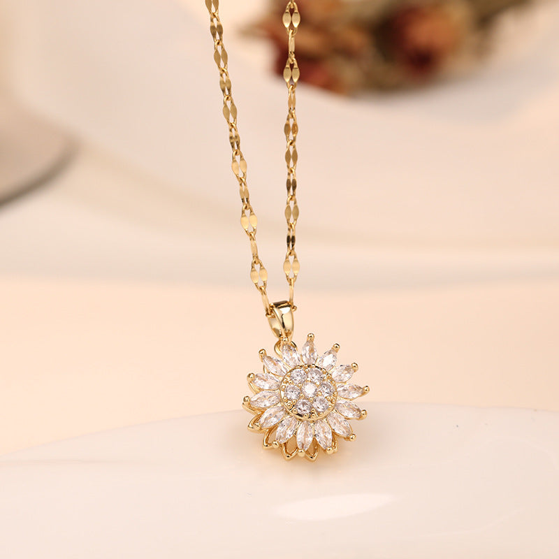 A Double-layer Rotatable Sunflower Necklace Jewelry with a flower on it from Maramalive™ brand.