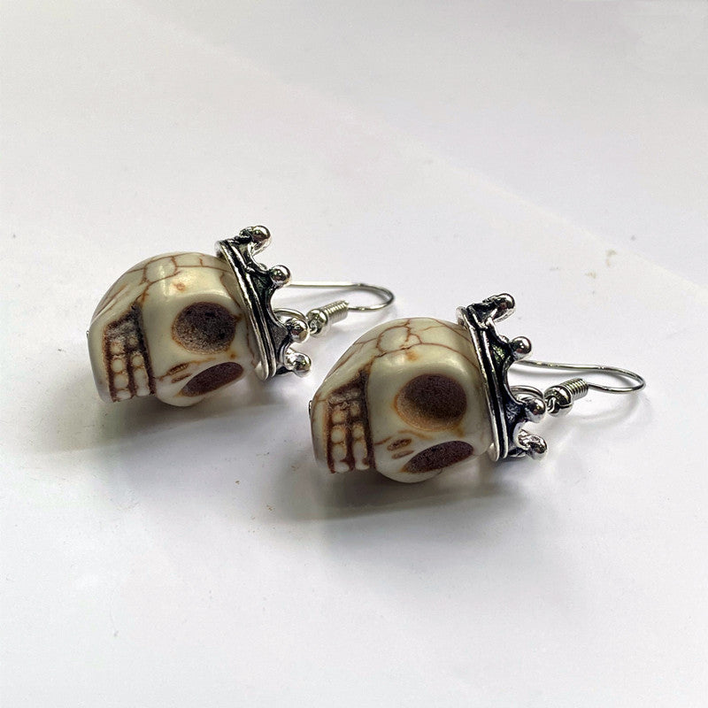 A pair of CJ's Retro Exaggerated Gothic Coronation Crown Skull Earrings Halloween Gift Witch Jewelry.