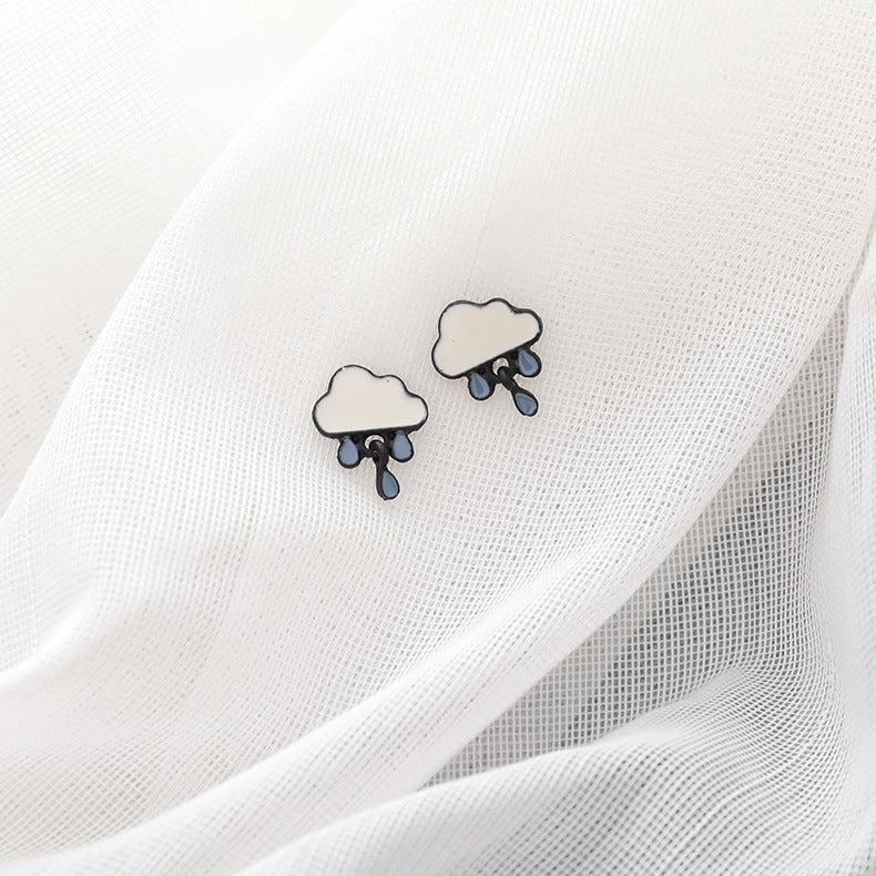 Graceful Cute Stud Earrings by Maramalive™ on a blue plate.