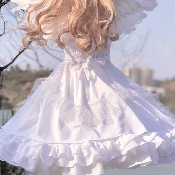 A girl showcasing her fashion style in a White Angel Jsk Fairytale Lolita Vintage Girls Gothic Lace Wedding Gown Cosplay Princess Dress made by Maramalive™.
