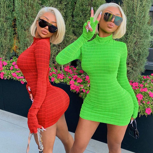 Two women posing in a green Step skirt dress, featuring color variation from Maramalive™.