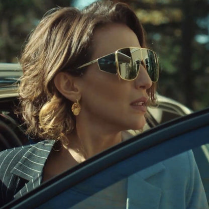A woman wearing Maramalive™ Steampunk Sunglasses in a car.