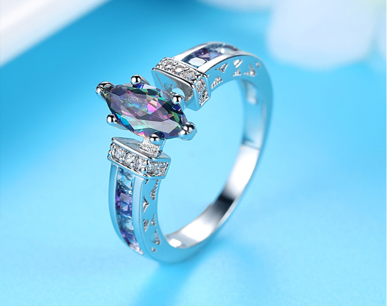 A Maramalive™ Colorful Horse Eye Ring with diamonds.