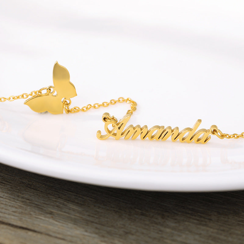 A Maramalive™ personalized butterfly name necklace.