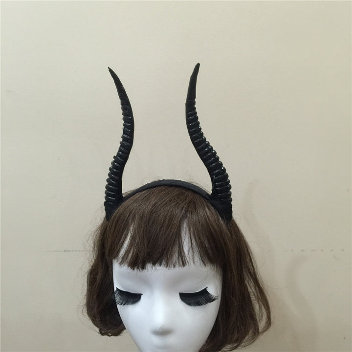 A Gothic Devil Horn Headband - Macabre Demon Antler Headpiece by Maramalive™, with demon antler horns.