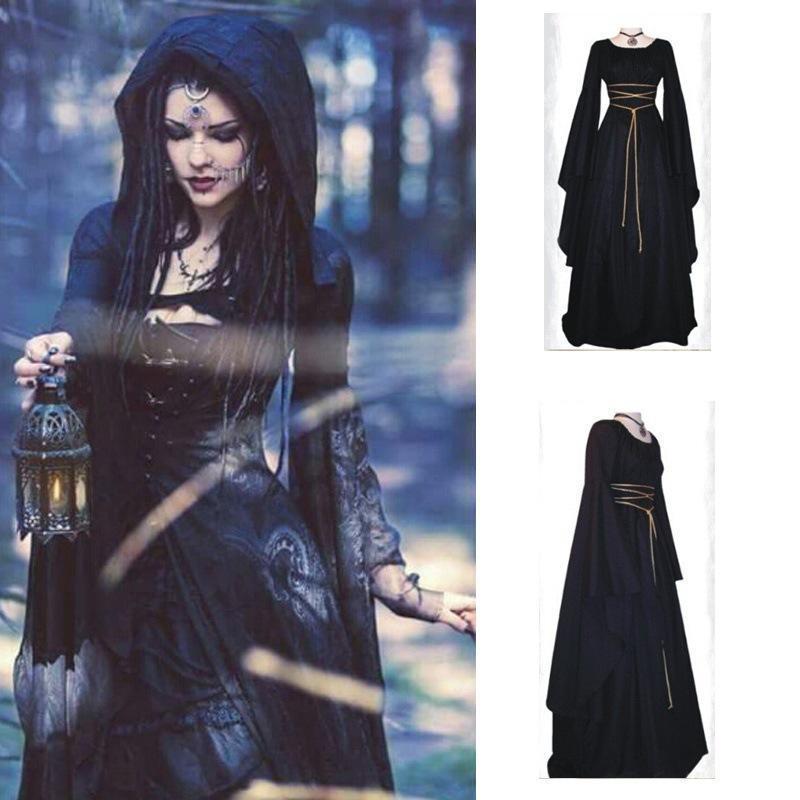 A woman in a vintage Maramalive™ Medieval Witch Halloween Costume -Vintage Pagan Long Sleeved Dress with a lantern.