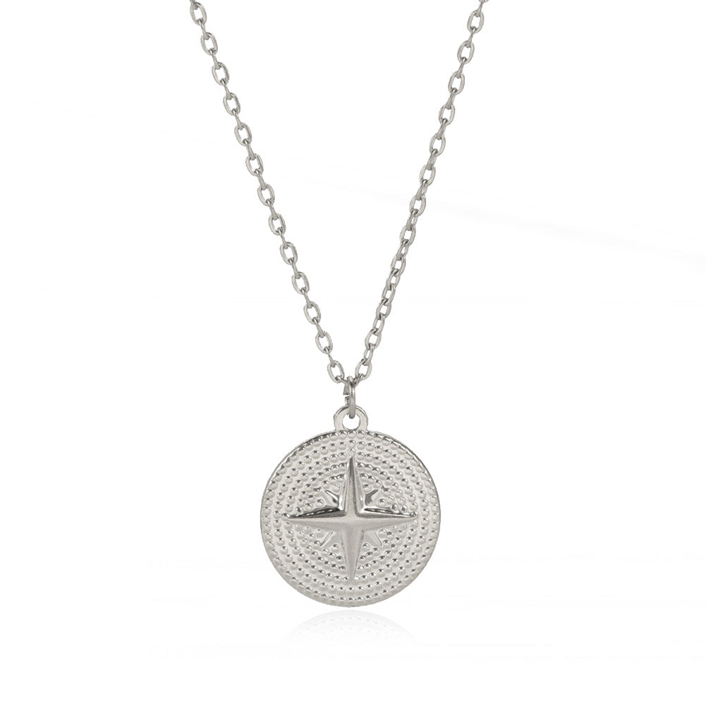 A woman wearing a Maramalive™ Titanium Steel Oil Pressure Round Brand Four Octagram Necklace.