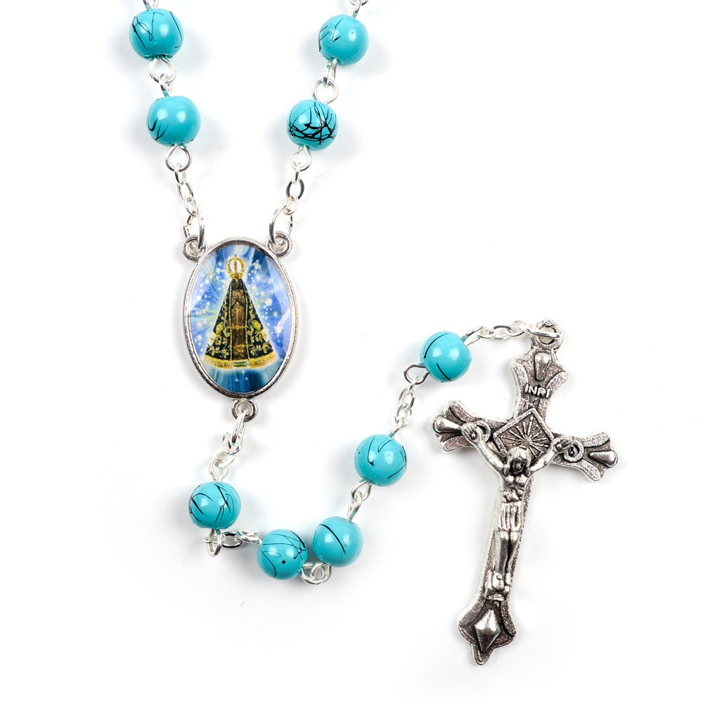 Blue glass virgin mary rosary necklace