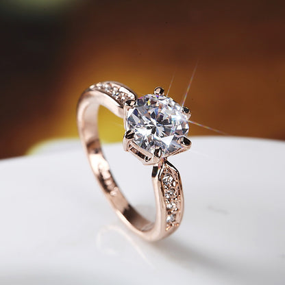 A Maramalive™ Zircon Ring with a diamond in the center.