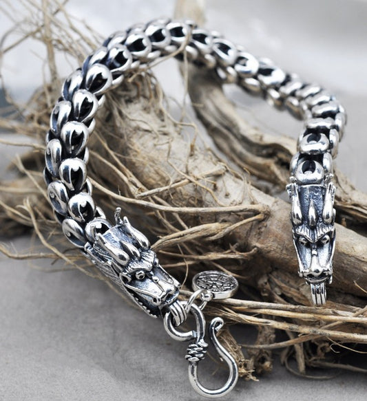 A Maramalive™ S925 Sterling Silver Dragon Scale Retro Bracelet with a dragon head on it.