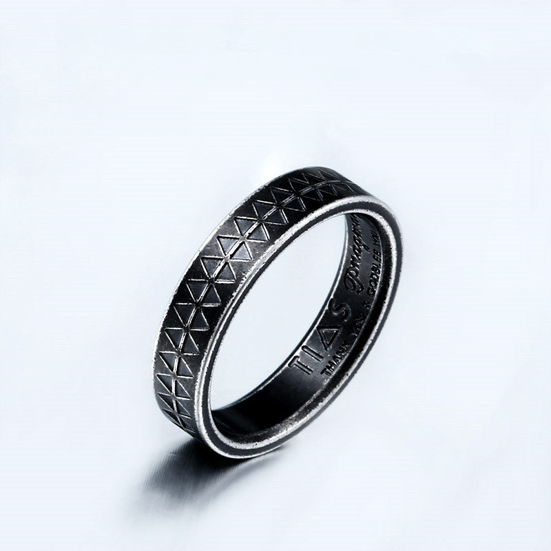 A Geometric Punk Gothic Steel Men's Ring with diamonds on it.